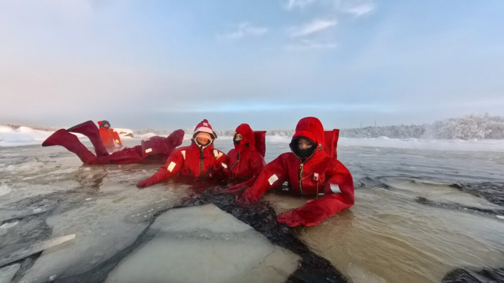 Guests ice floating beside the snowy Murmansk shore